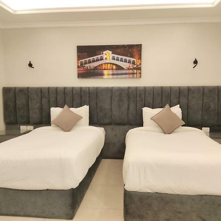 Grand Plaza Sheikh Zayed Hotell Kafr Abu 'umaydah Exteriör bild