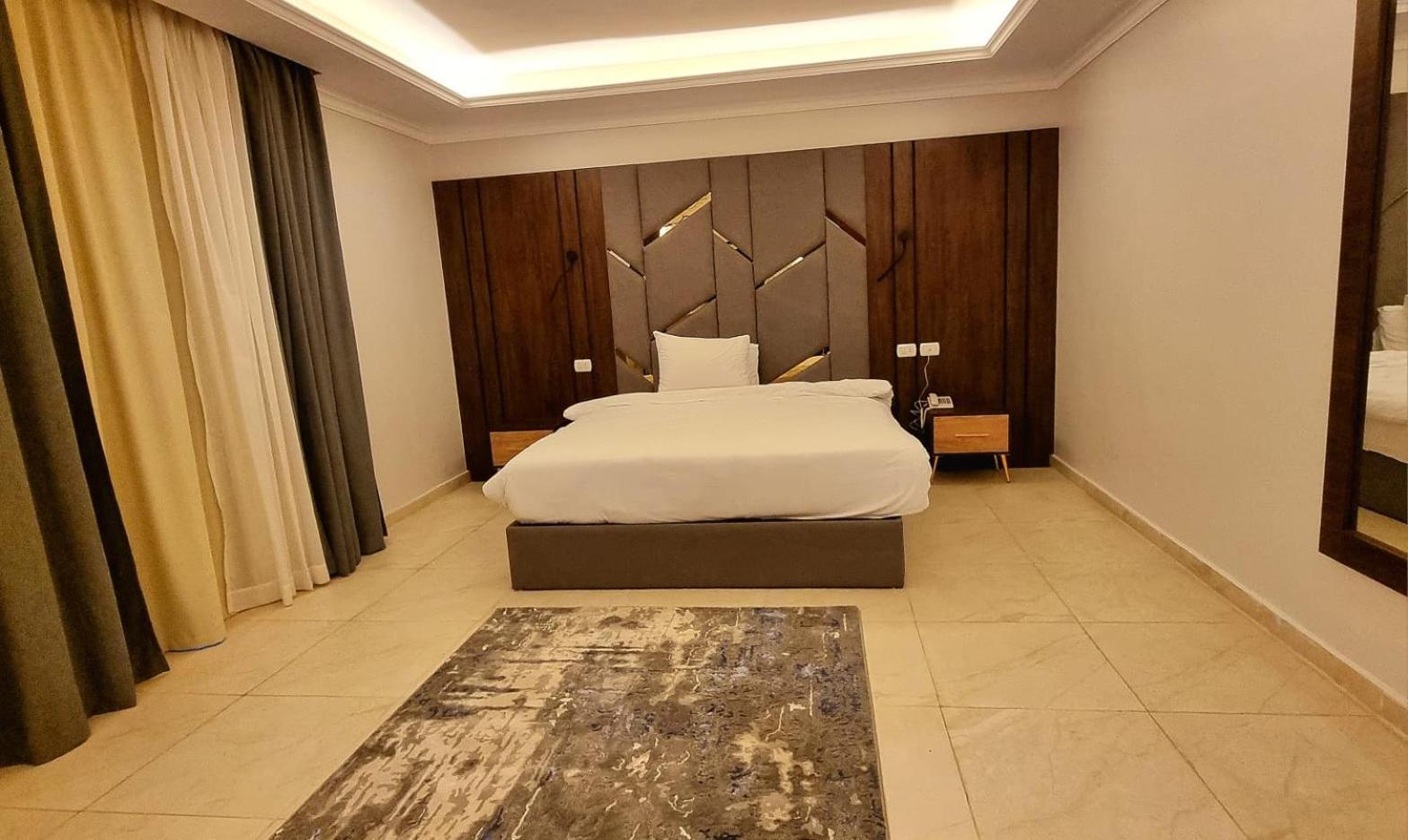 Grand Plaza Sheikh Zayed Hotell Kafr Abu 'umaydah Rum bild