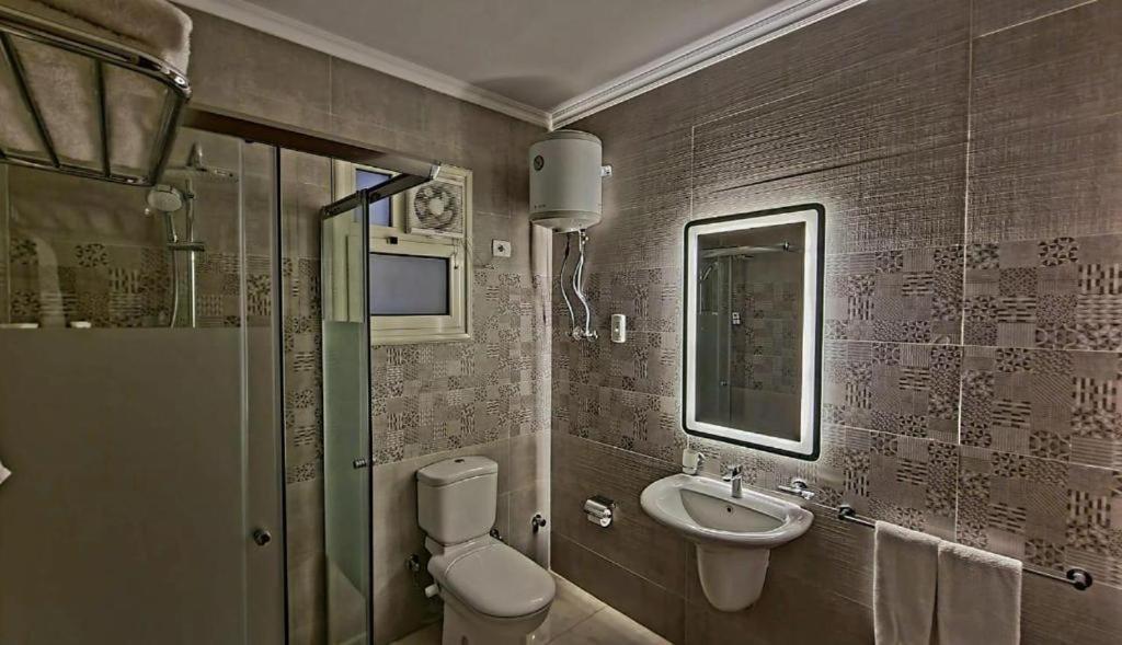 Grand Plaza Sheikh Zayed Hotell Kafr Abu 'umaydah Exteriör bild