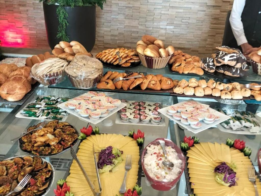 Grand Plaza Sheikh Zayed Hotell Kafr Abu 'umaydah Exteriör bild