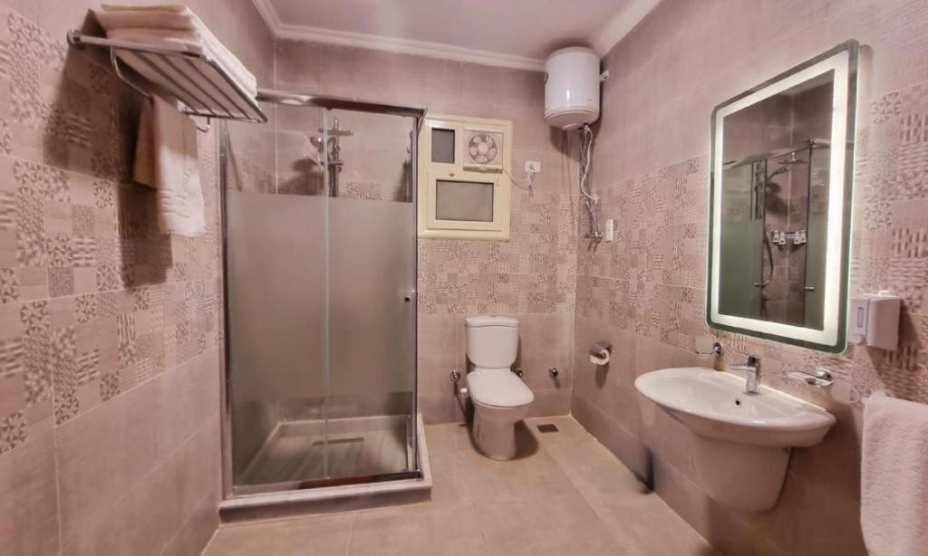 Grand Plaza Sheikh Zayed Hotell Kafr Abu 'umaydah Exteriör bild