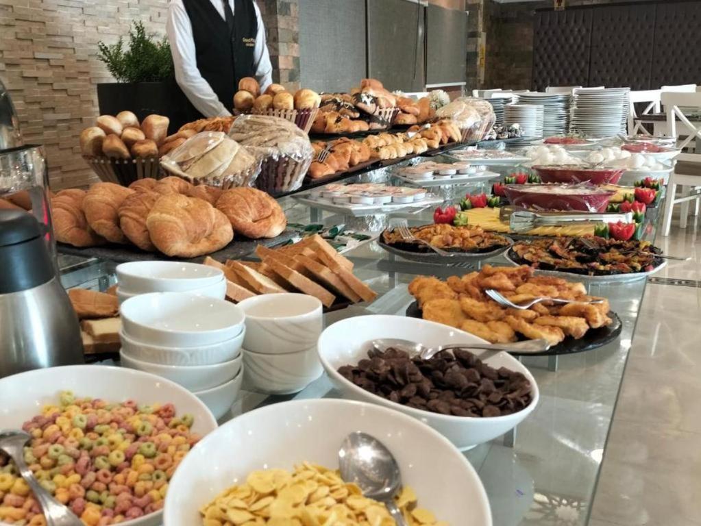 Grand Plaza Sheikh Zayed Hotell Kafr Abu 'umaydah Exteriör bild