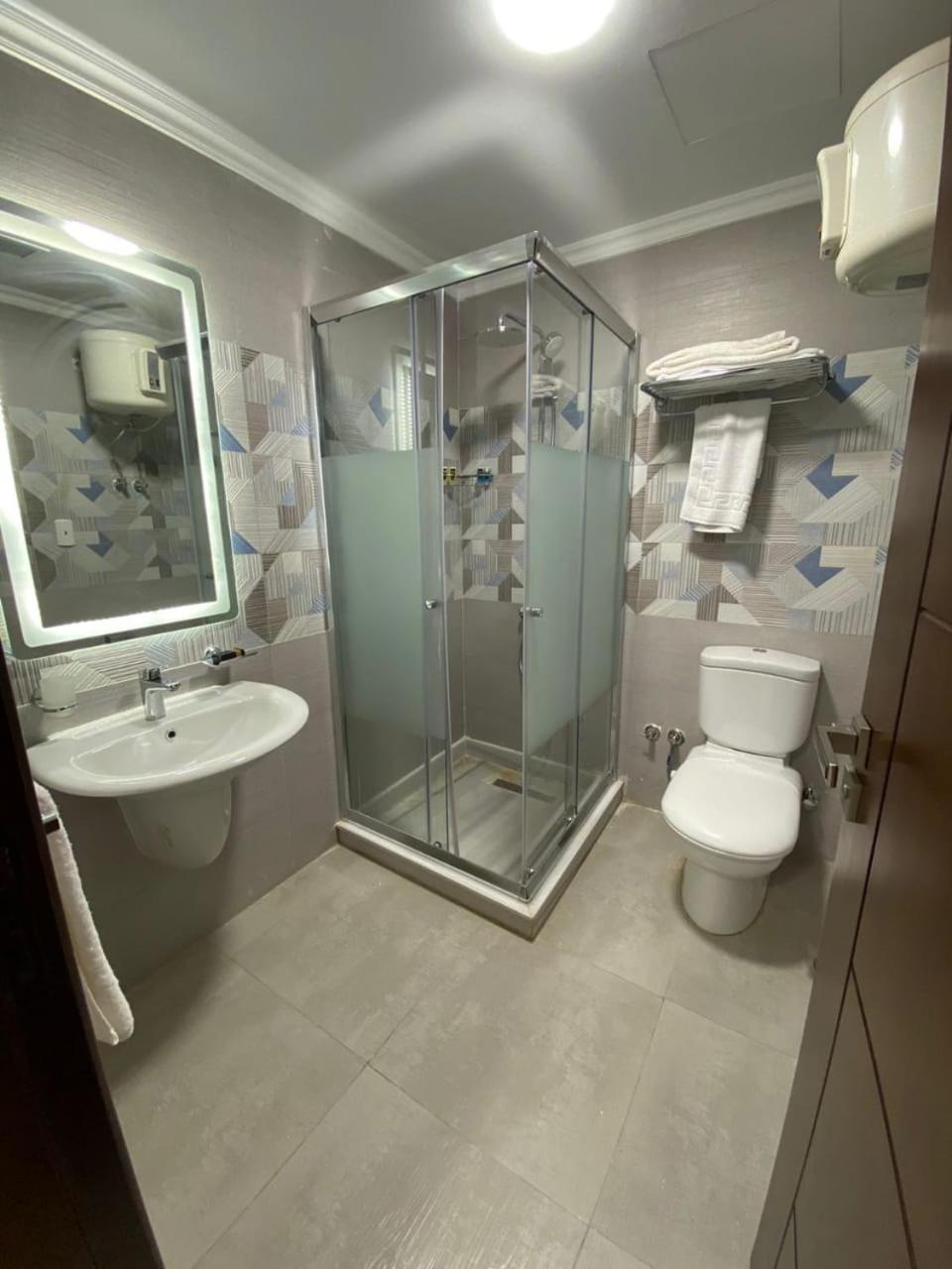 Grand Plaza Sheikh Zayed Hotell Kafr Abu 'umaydah Exteriör bild