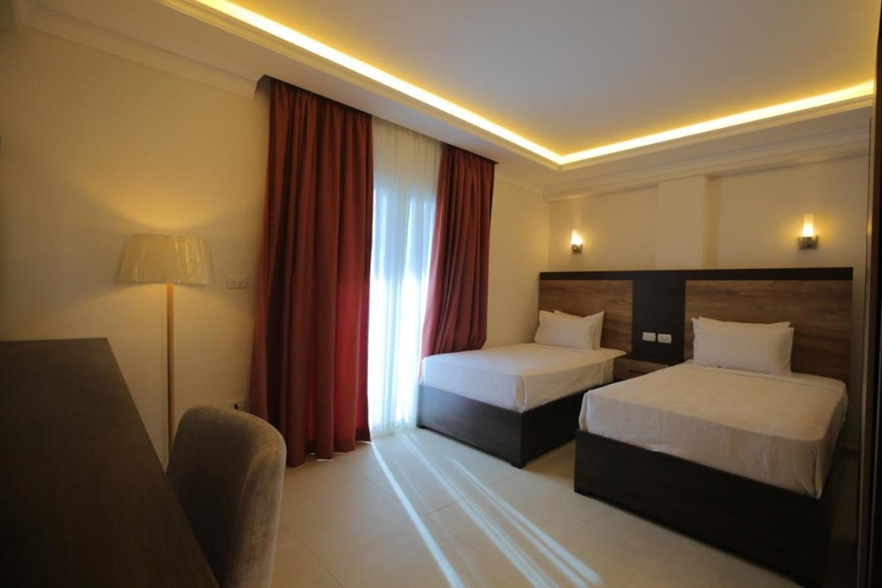 Grand Plaza Sheikh Zayed Hotell Kafr Abu 'umaydah Exteriör bild